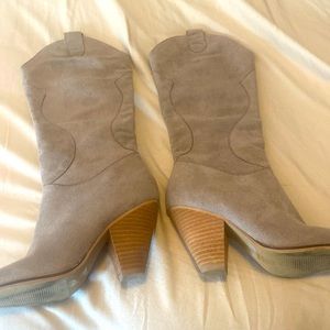 Like new barely worn tan boots. Cowboy style. Soft material. Size 6.